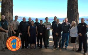 Leaders representing 17 Lake Tahoe land management, fire, and environmental agencies gather after signing the 10-year fuel reduction strategy at the Lake Tahoe Summit on August 6, 2025 at Valhalla Tahoe in South Lake Tahoe.